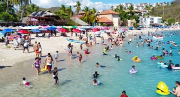 ¿Qué significan los colores de las banderas de advertencia que están en playas de Oaxaca?